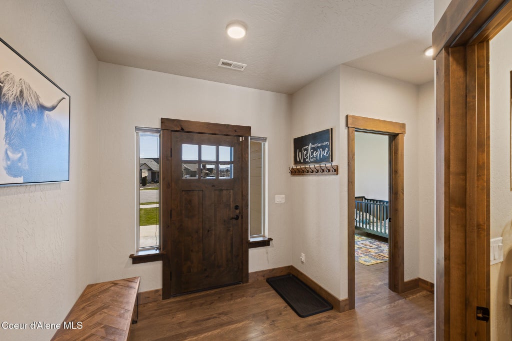 Photo of 1402 Wayward Cir, Post Falls, ID 83854 (MLS # 26-9898)