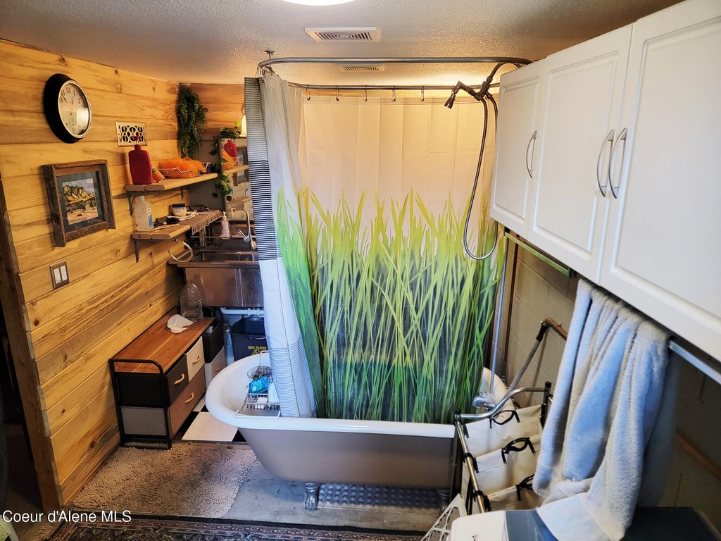 Photo of 50 CLAYTON Ave, Coeur dAlene, ID 83815 (MLS # 25-11465)