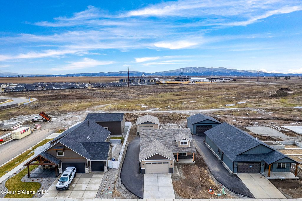 Photo of 8892 Swather Ave, Rathdrum, ID 83858 (MLS # 26-1570)