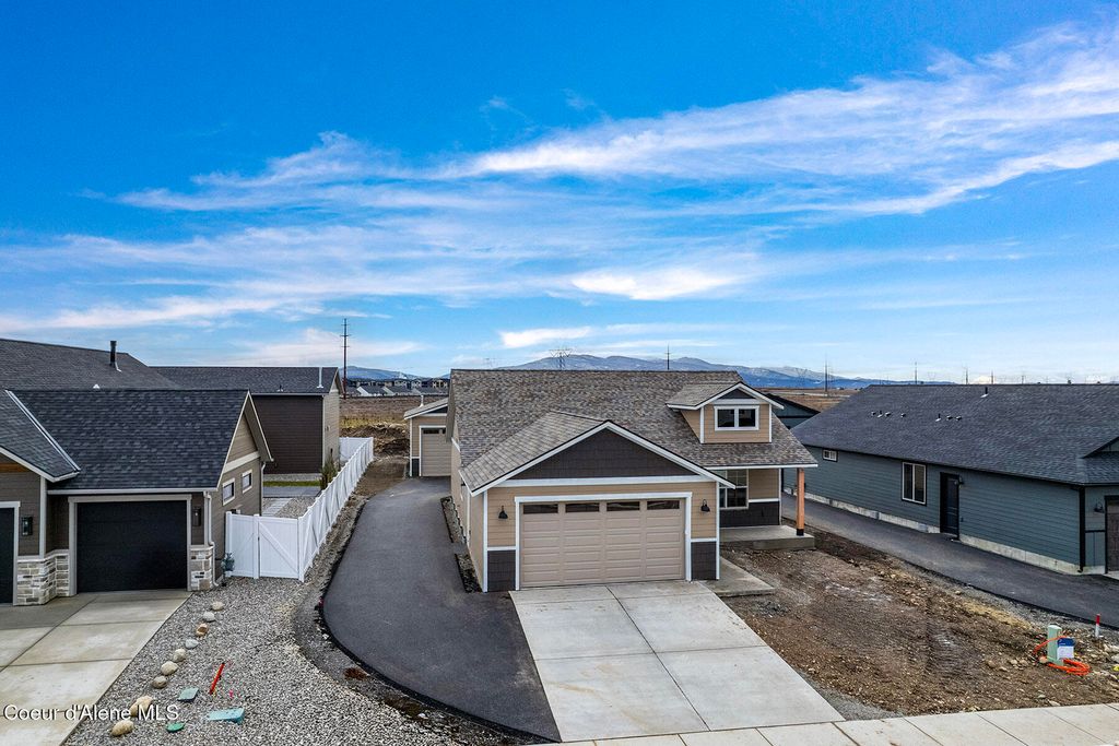 Photo of 8892 Swather Ave, Rathdrum, ID 83858 (MLS # 26-1570)