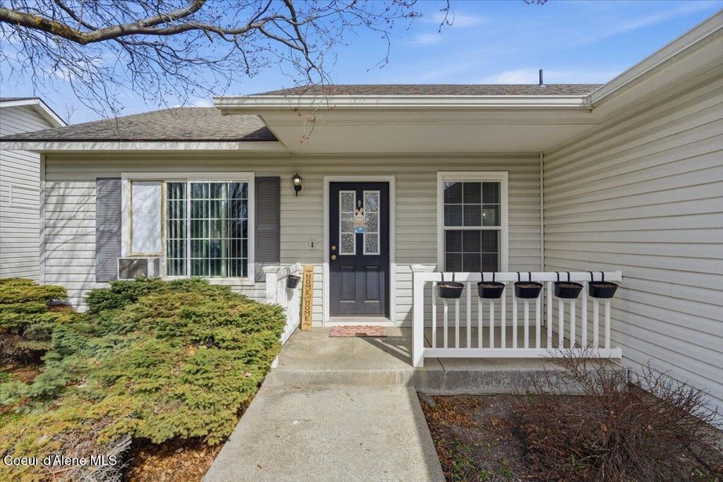 Photo of 4937 Palmwood Ln, Post Falls, ID 83854 (MLS # 26-2610)