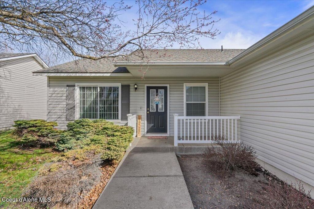 Photo of 4937 Palmwood Ln, Post Falls, ID 83854 (MLS # 26-2610)