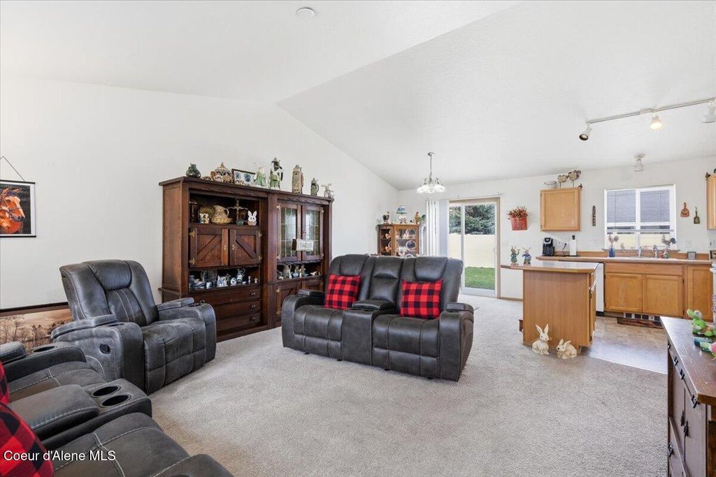 Photo of 4937 Palmwood Ln, Post Falls, ID 83854 (MLS # 26-2610)