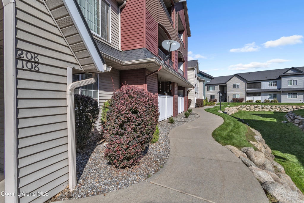 Photo of 322 Promenade LOOP #APT 108, Post Falls, ID 83854 (MLS # 26-9629)