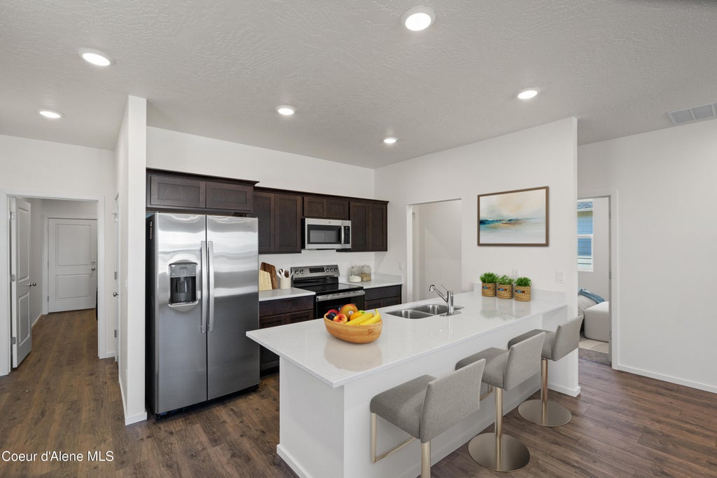 Photo of 5392 Aquila Ave, Post Falls, ID 83854 (MLS # 26-9362)