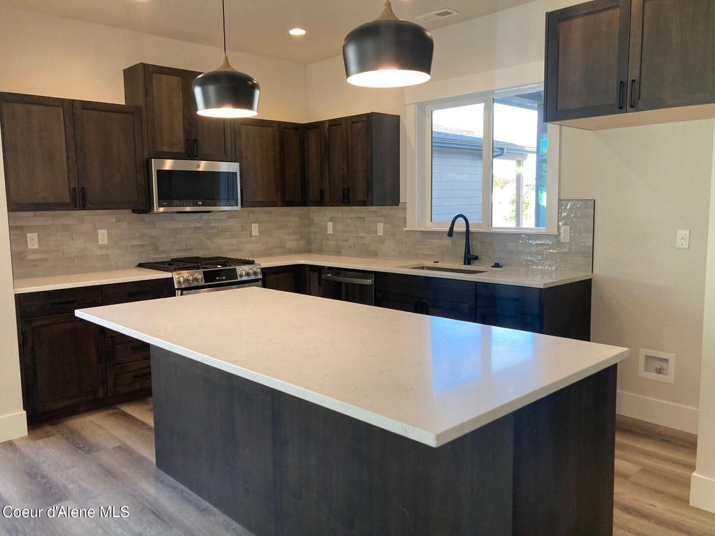 Photo of 7291 Grafton St, Coeur dAlene, ID 83815 (MLS # 26-10164)