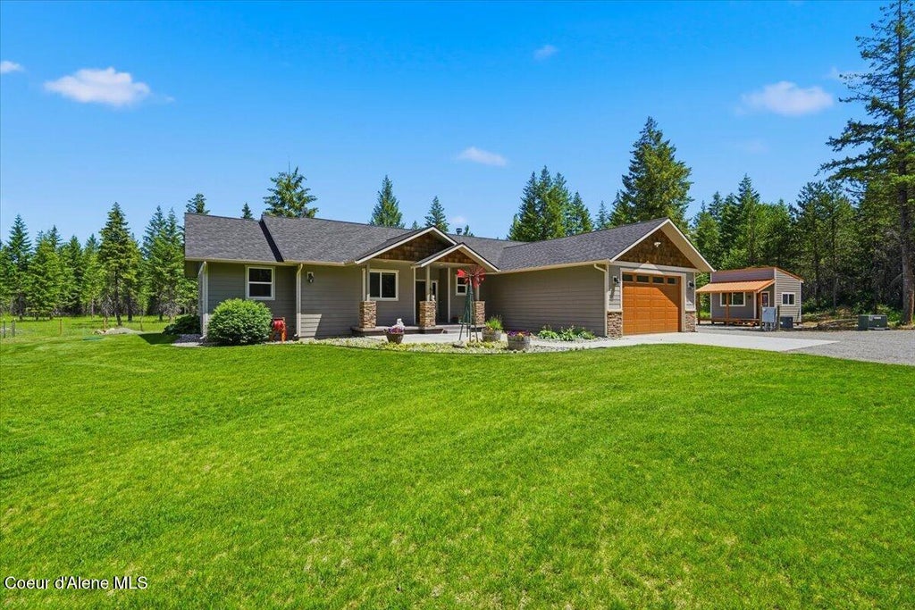 Photo of 517 Songbird Way, Spirit Lake, ID 83869 (MLS # 26-3188)
