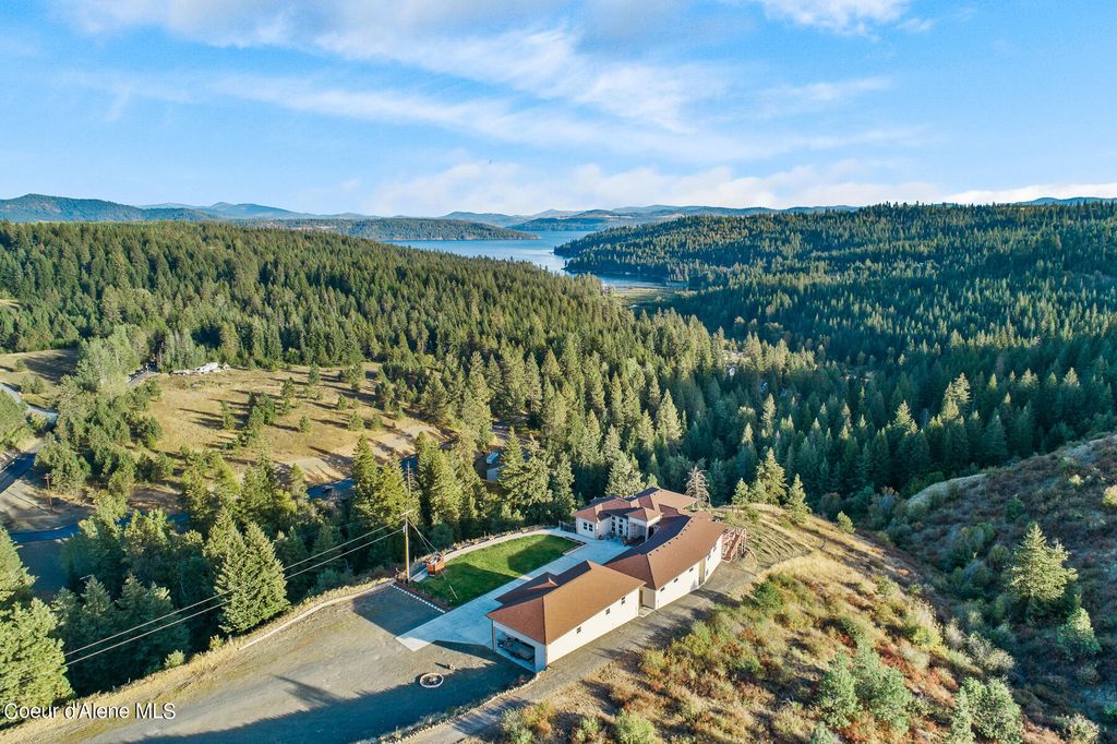 Photo of 12474 ROCKFORD BAY Rd, Coeur dAlene, ID 83814 (MLS # 25-665)