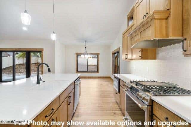 Photo of 957 STEEPLE CHASE Rd, Hayden, ID 83835 (MLS # 26-7869)