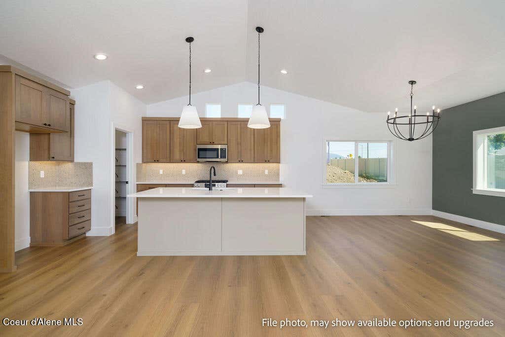 Photo of 957 STEEPLE CHASE Rd, Hayden, ID 83835 (MLS # 26-7869)
