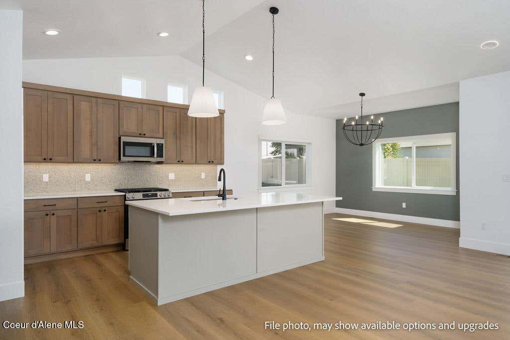 Photo of 957 STEEPLE CHASE Rd, Hayden, ID 83835 (MLS # 26-7869)