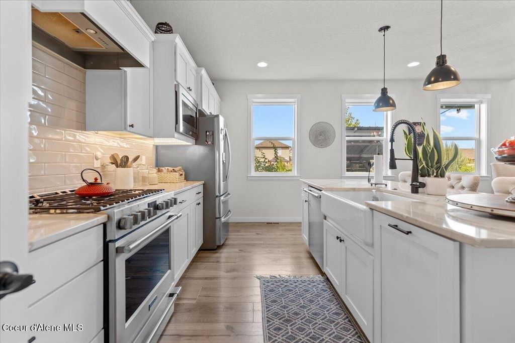 Photo of 4147 HOMEWARD BOUND Blvd, Coeur dAlene, ID 83815 (MLS # 25-9337)