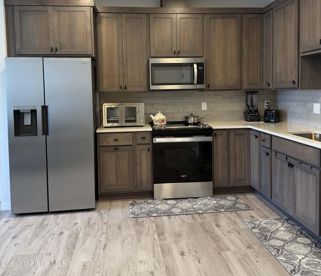 Photo of 6480 ATLAS RD #203, Coeur dAlene, ID 83815 (MLS # 26-6980)