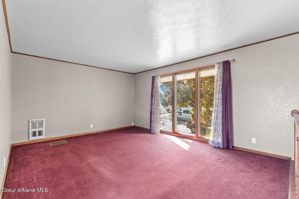 Photo of 1052 Monarch Ave, Post Falls, ID 83854 (MLS # 25-10368)