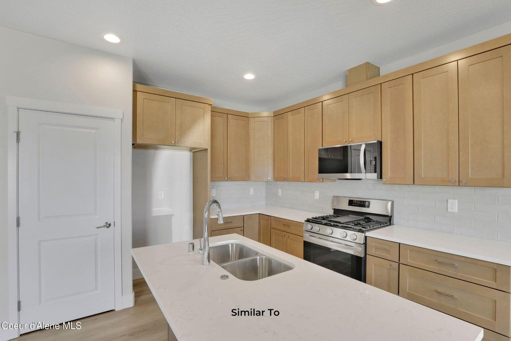 Photo of 4773 Ashwood Ln Ln, Post Falls, ID 83854 (MLS # 26-10507)