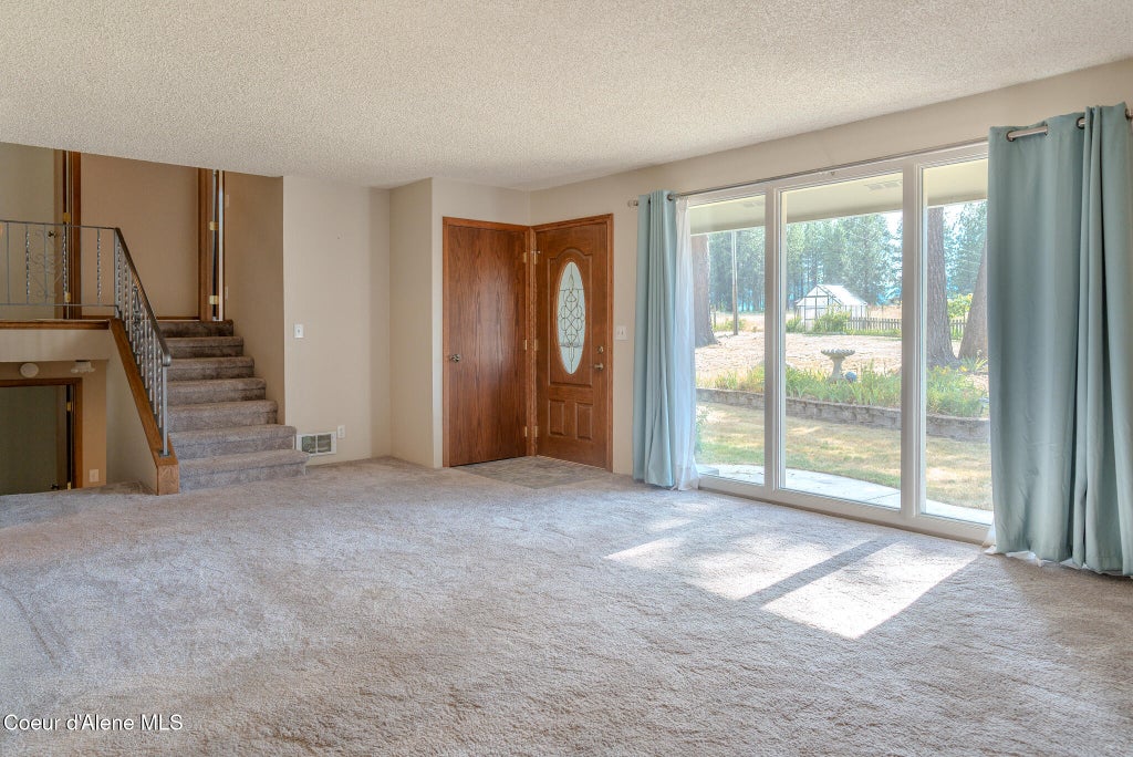 Photo of 7672 Carnie Rd, Coeur dAlene, ID 83814 (MLS # 26-1633)