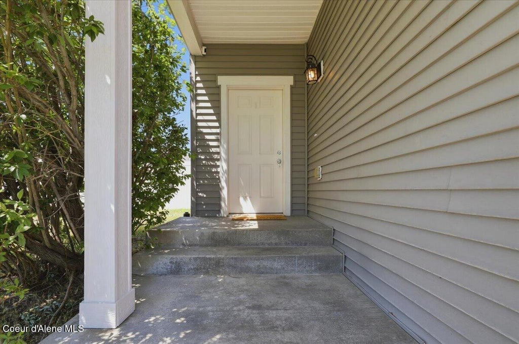 Photo of 8081 Woodworth ST, Post Falls, ID 83854 (MLS # 26-6360)