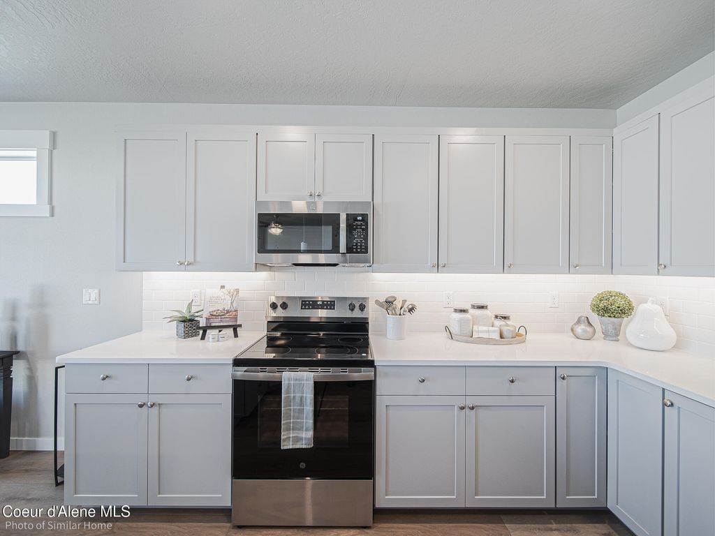 Photo of 1472 McKelvy, Post Falls, ID 83854 (MLS # 25-11564)