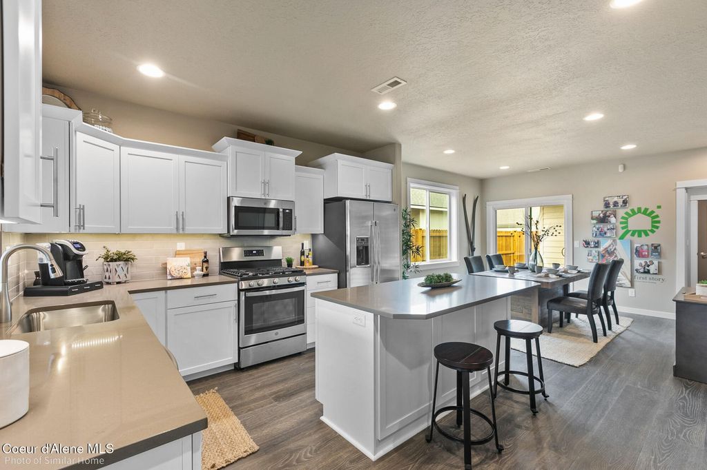 Photo of 12137 Bodine Ave, Post Falls, ID 83854 (MLS # 26-6503)