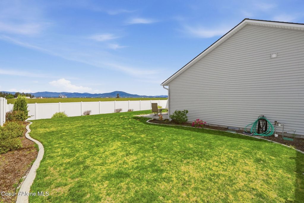 Photo of 12704 CAVANAUGH Dr, Rathdrum, ID 83858 (MLS # 26-5386)