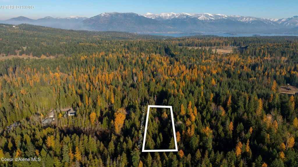 Photo of 9816 Bottle Bay Rd, Sagle, ID 83860 (MLS # 26-4489)