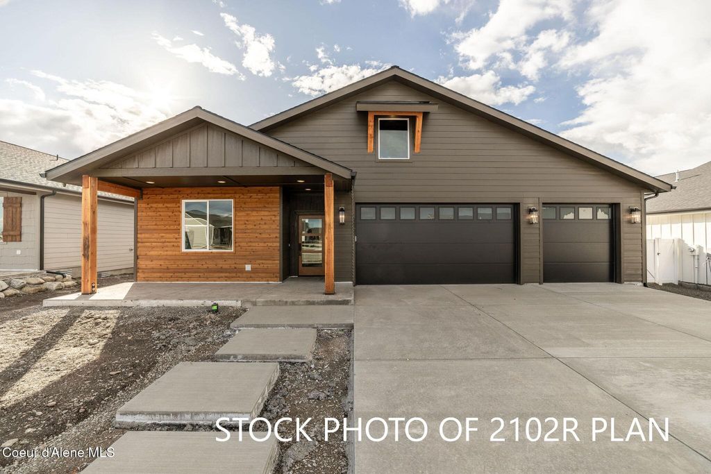 Photo of 9105 Swather Ave, Rathdrum, ID 83858 (MLS # 25-11556)