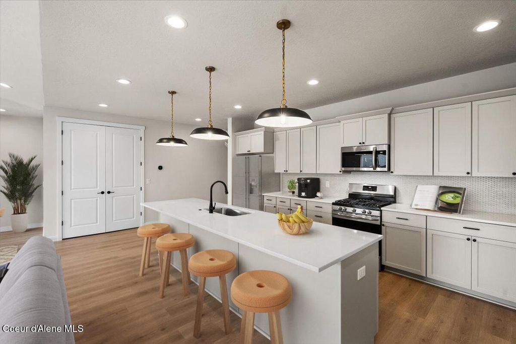 Photo of 6817 Coeur Terre Blvd, Coeur dAlene, ID 83815 (MLS # 25-11280)