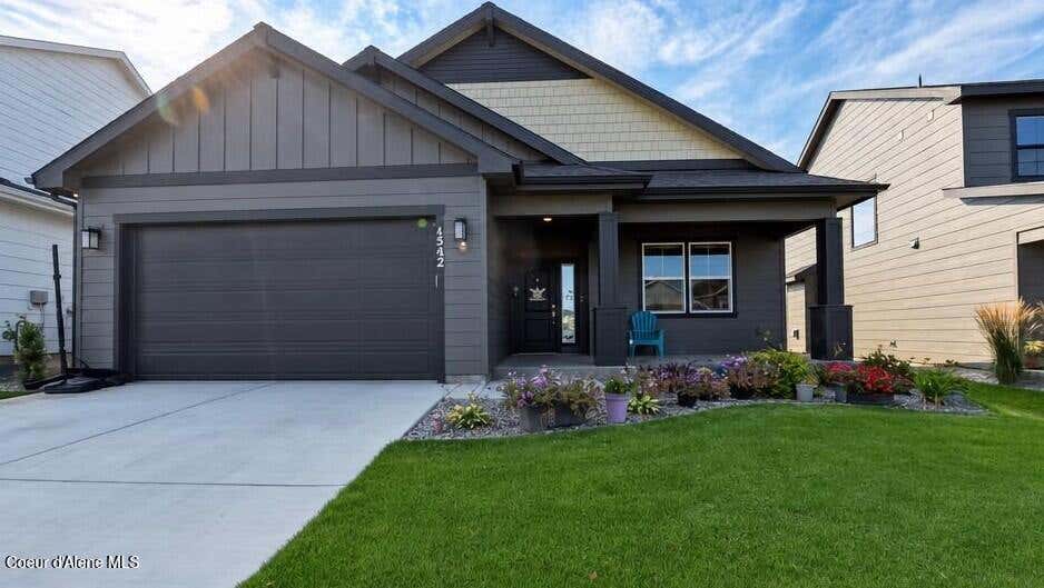 Photo of 1542 OKANOGAN Ave, Post Falls, ID 83854 (MLS # 26-8414)
