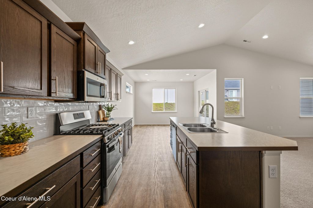 Photo of 5977 Theismann Rd, Rathdrum, ID 83858 (MLS # 26-3612)