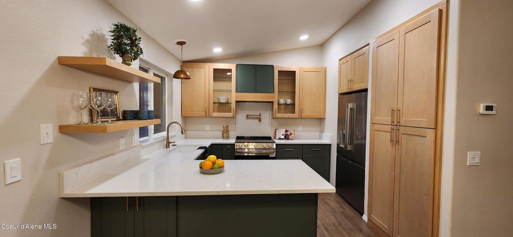 Photo of 208 Riverwood, Post Falls, ID 83854 (MLS # 26-3657)