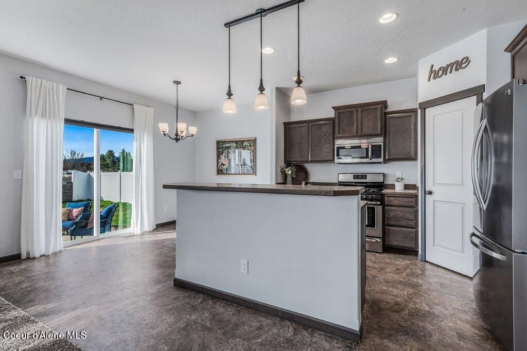 Photo of 8361 Scotsworth St, Post Falls, ID 83854 (MLS # 26-2856)