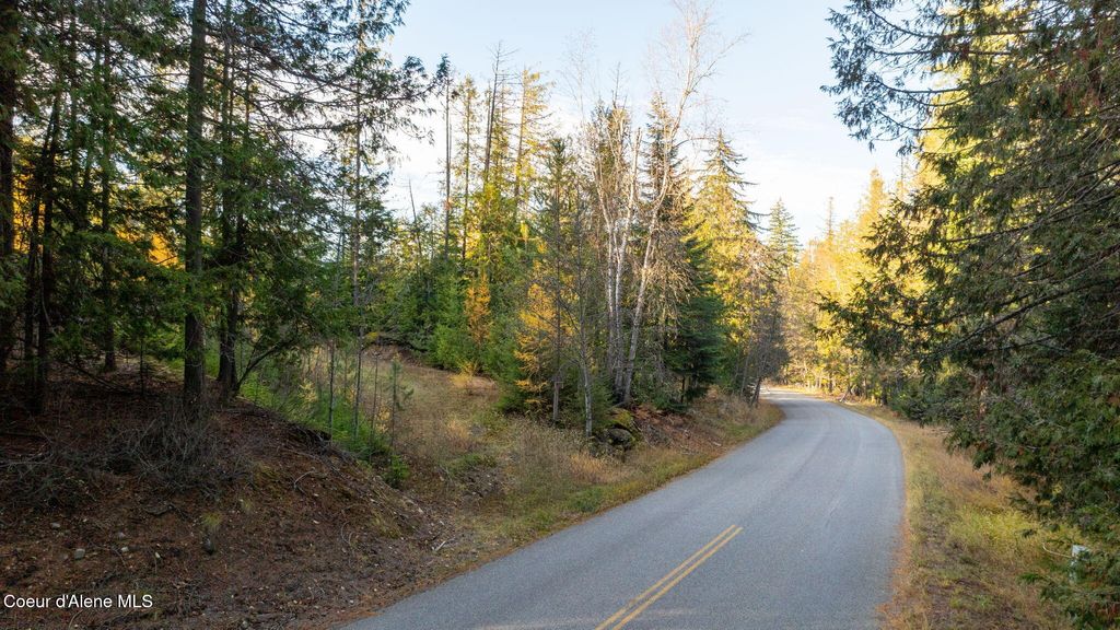 Photo of 9816 Bottle Bay Rd, Sagle, ID 83860 (MLS # 25-5766)