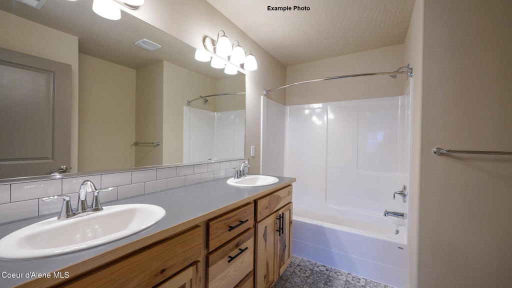 Photo of 1526 ALLENBY Ave, Post Falls, ID 83854 (MLS # 26-7391)