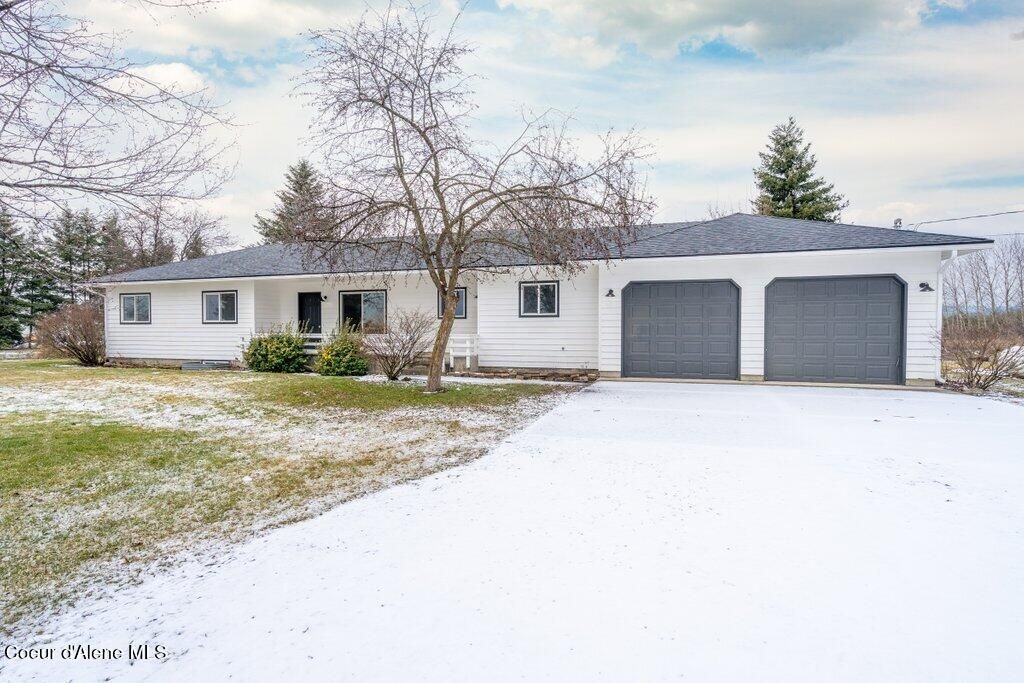 Photo of 10759 Idaho Rd, Post Falls, ID 83854 (MLS # 26-873)