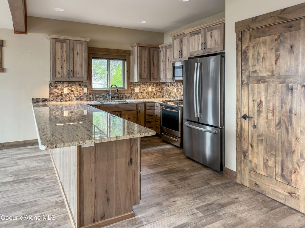 Photo of 74 Palouse Dr, Nordman, ID 83848 (MLS # 26-1396)