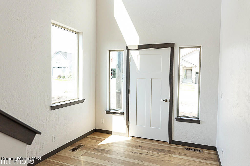 Photo of 4449 Savea Ln, Post Falls, ID 83854 (MLS # 26-9845)