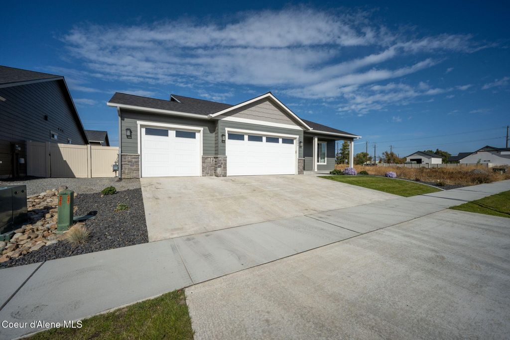 Photo of 1941 Mykal Ct, Post Falls, ID 83854 (MLS # 25-10250)