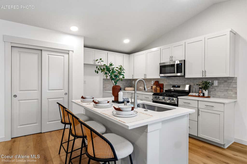 Photo of 12128 Kilkenny Dr, Post Falls, ID 83854 (MLS # 26-8799)