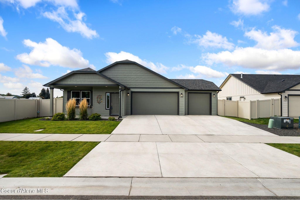Photo of 1409 Mongeau St, Post Falls, ID 83854 (MLS # 26-10490)