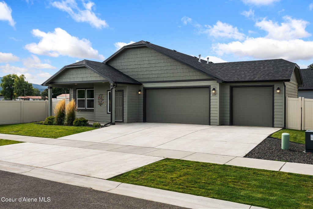 Photo of 1409 Mongeau St, Post Falls, ID 83854 (MLS # 26-10490)