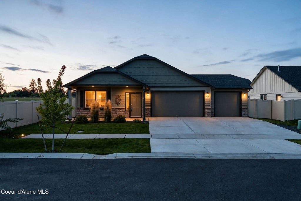Photo of 1409 Mongeau St, Post Falls, ID 83854 (MLS # 26-10490)