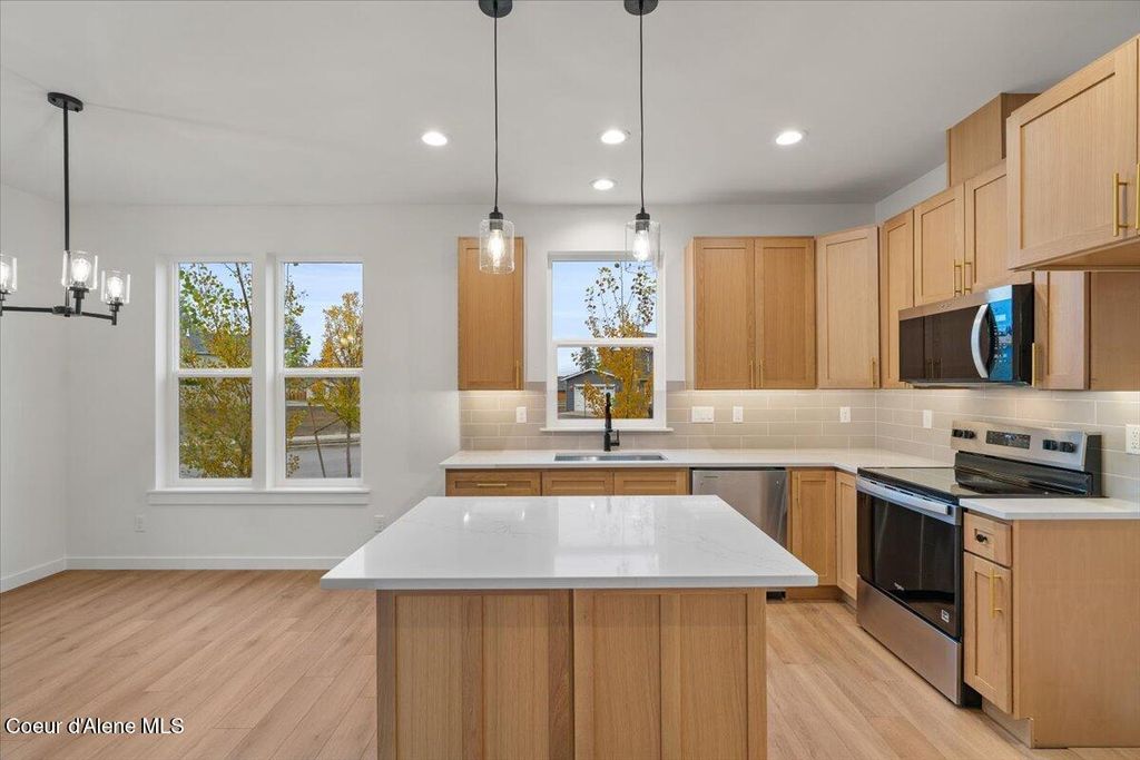 Photo of 335 Grosbeak Ave, Hayden, ID 83835 (MLS # 25-10946)