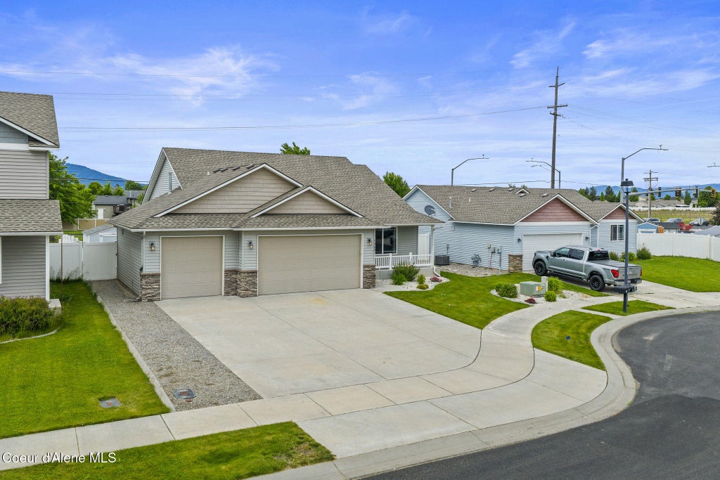Photo of 1969 HIGHWING Ct, Post Falls, ID 83854 (MLS # 26-5980)