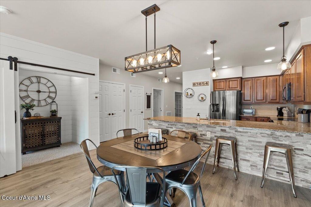 Photo of 415 WATERSIDE Dr #104, Post Falls, ID 83854 (MLS # 25-10908)