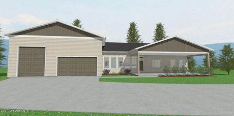 Photo of 107 Blazing Saddle, Pinehurst, ID 83850 (MLS # 26-2183)