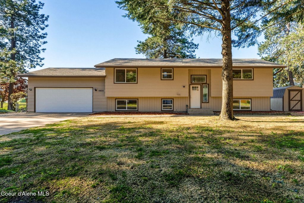Photo of 5605 PINEGROVE DR, Coeur dAlene, ID 83814 (MLS # 26-4661)
