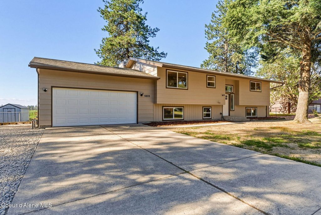 Photo of 5605 PINEGROVE DR, Coeur dAlene, ID 83814 (MLS # 26-4661)