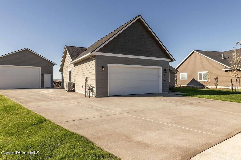 Photo of 6742 DALTREY Way, Rathdrum, ID 83858 (MLS # 26-2088)