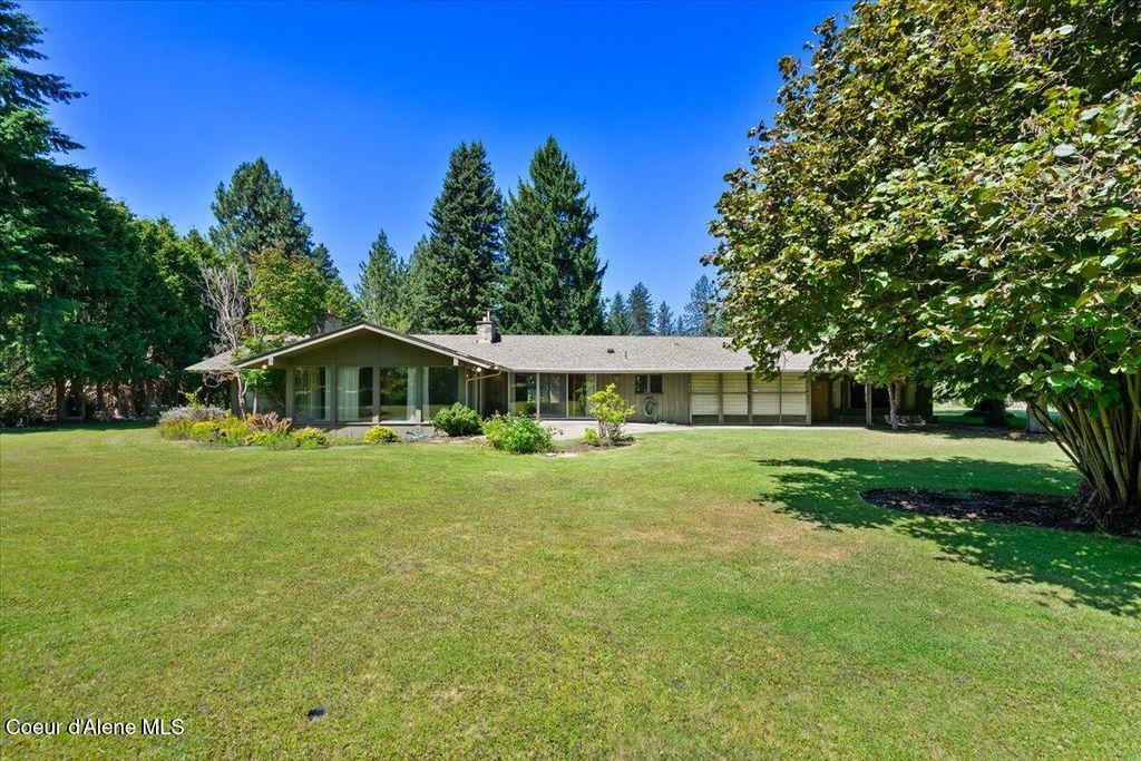 Photo of 9603 STRAHORN Rd, Hayden Lake, ID 83835 (MLS # 25-7124)