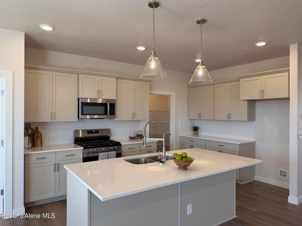 Photo of 6761 Coeur Terre Blvd, Coeur dAlene, ID 83815 (MLS # 26-4361)